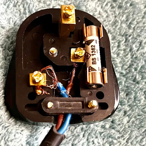 A badly wire plug that has been fixed