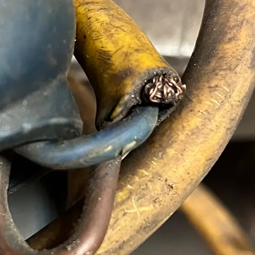 An exposed and burnt wire