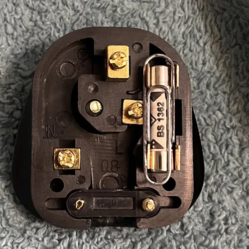 Plug socket using a paperclip as a fuse