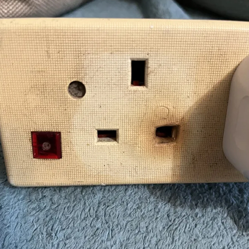 Burnt plug socket